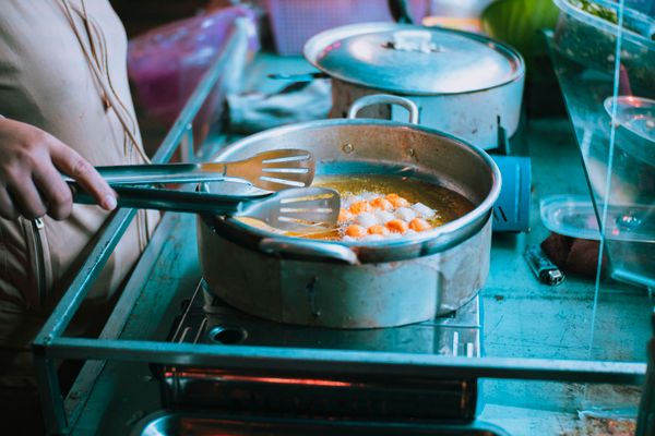 Close-up of a seasoned carbon steel pan surface