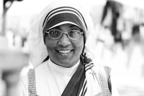 Woman Wearing a Veil and Eyeglasses