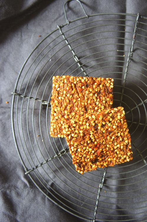 Square oat snack bars cooling on a wire rack