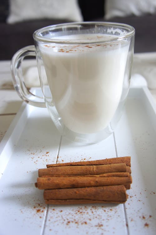 Free Cinnamon Sticks beside the Glass of Milk Stock Photo