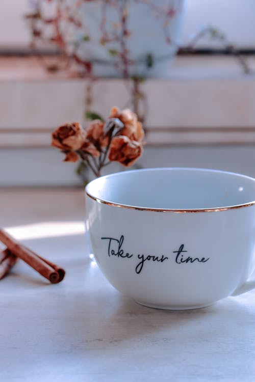Ceramic cup with Take Your Time inscription