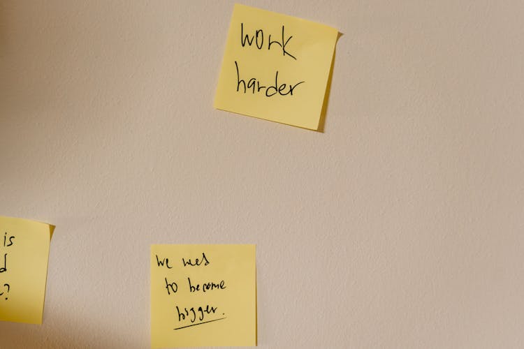 Sticky Notes  With Written Messages Posted On The Wall