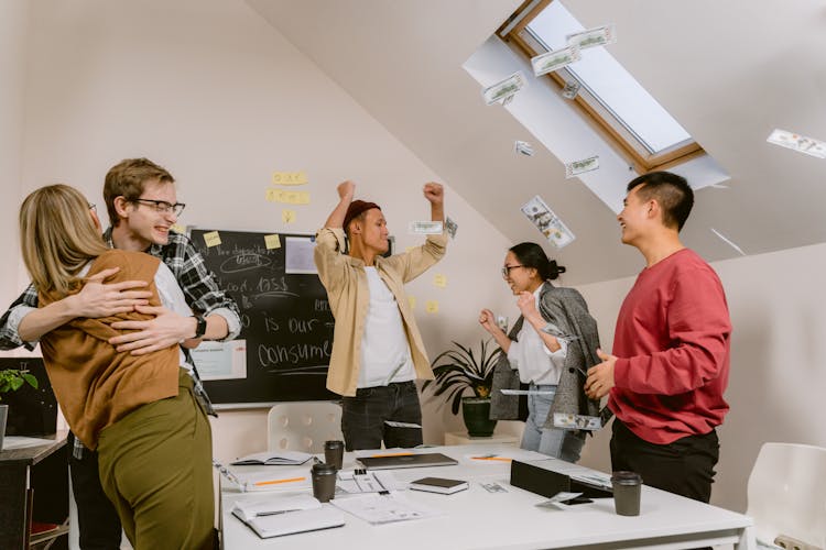 A Group Of Happy People In An Office