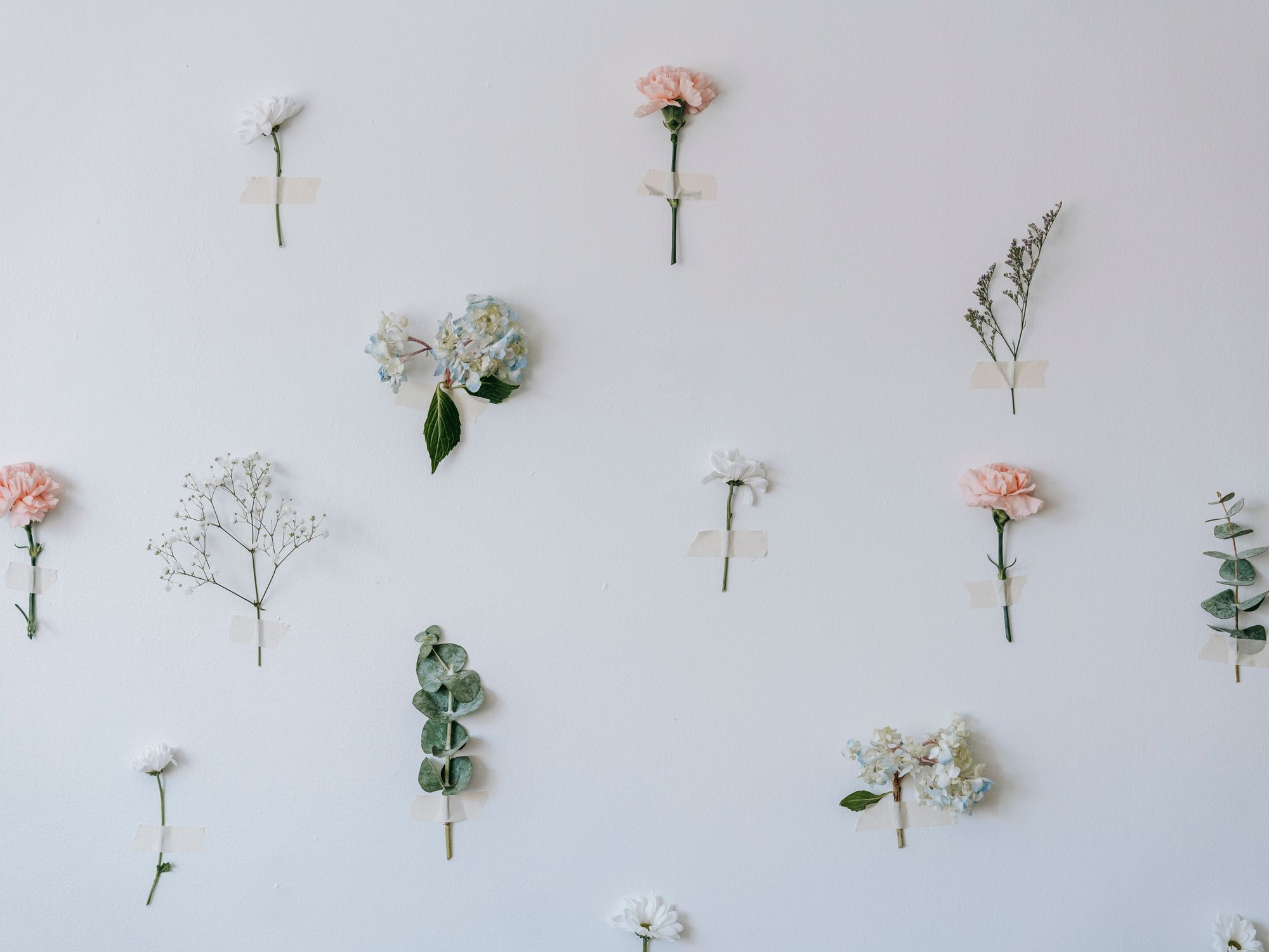Wallpapering in Richmond, Richmond upon Thames — decorator hanging pattern-matched wallpaper