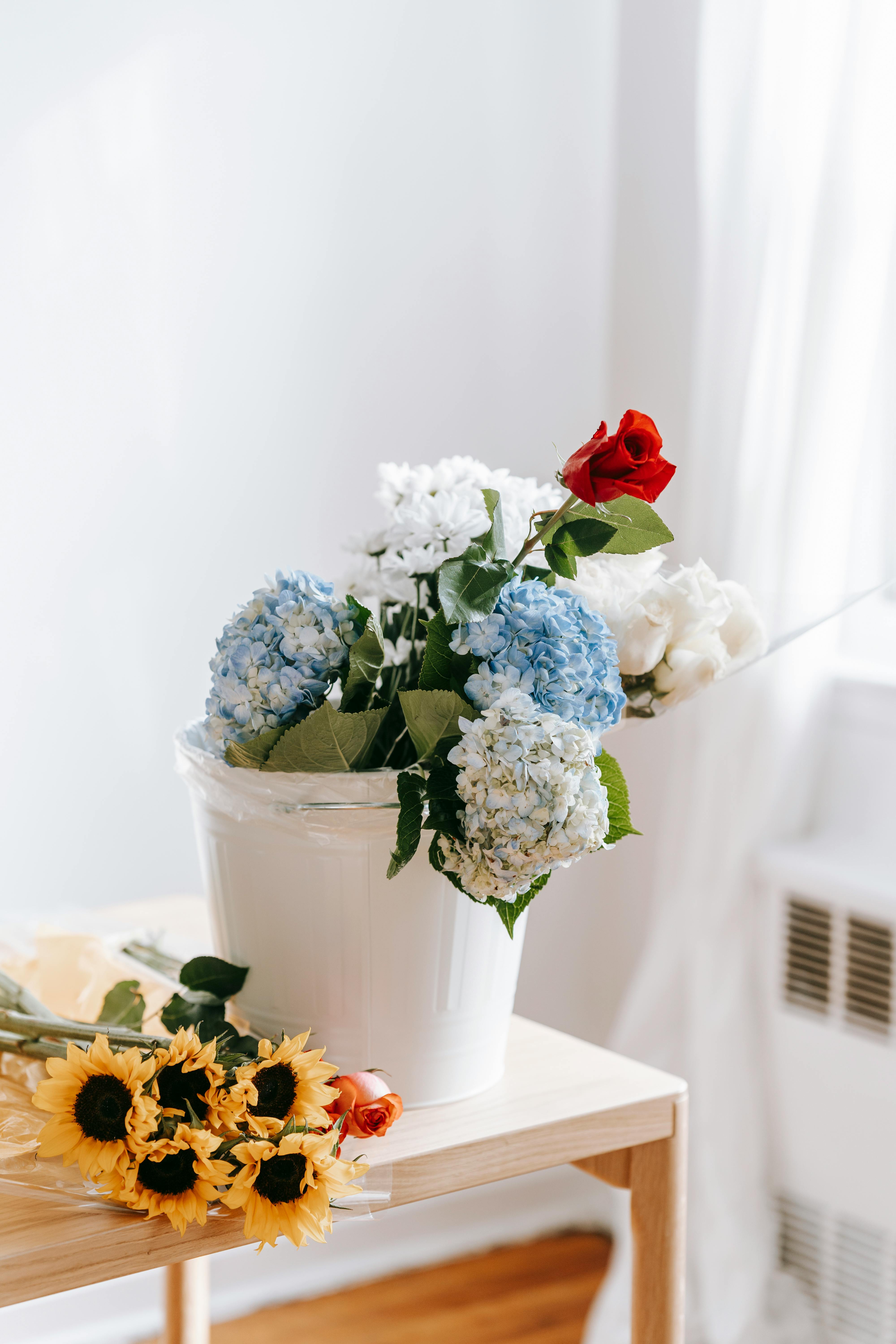 bunch of flowers on table