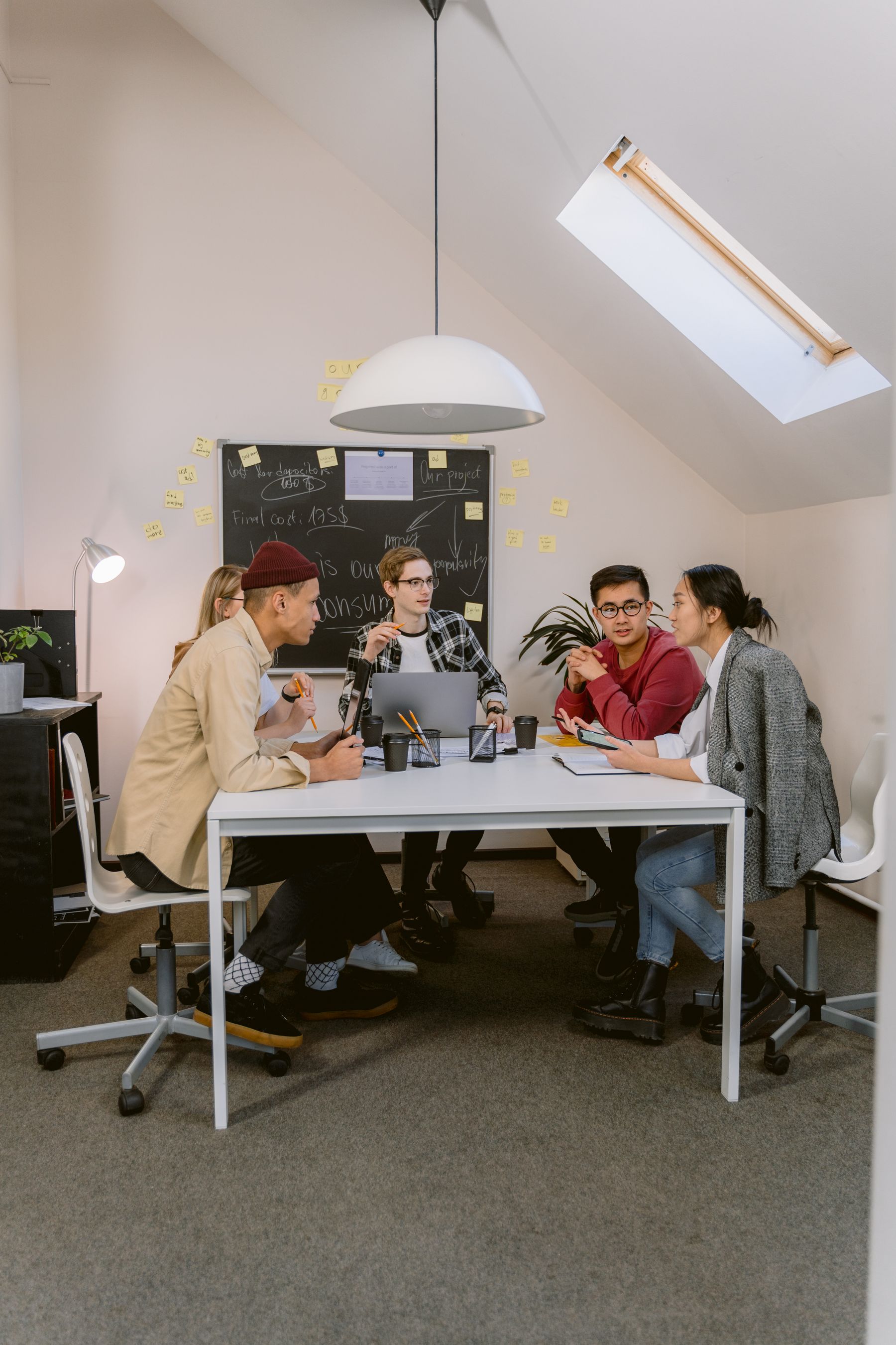 A diverse professional team having a collaborative leadership discussion
