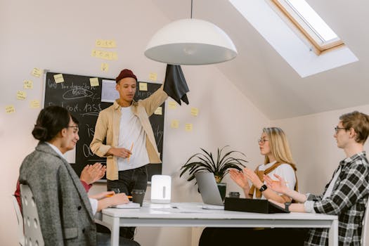 Business team engaging in a brainstorming session, showcasing teamwork and creativity in a modern office space.