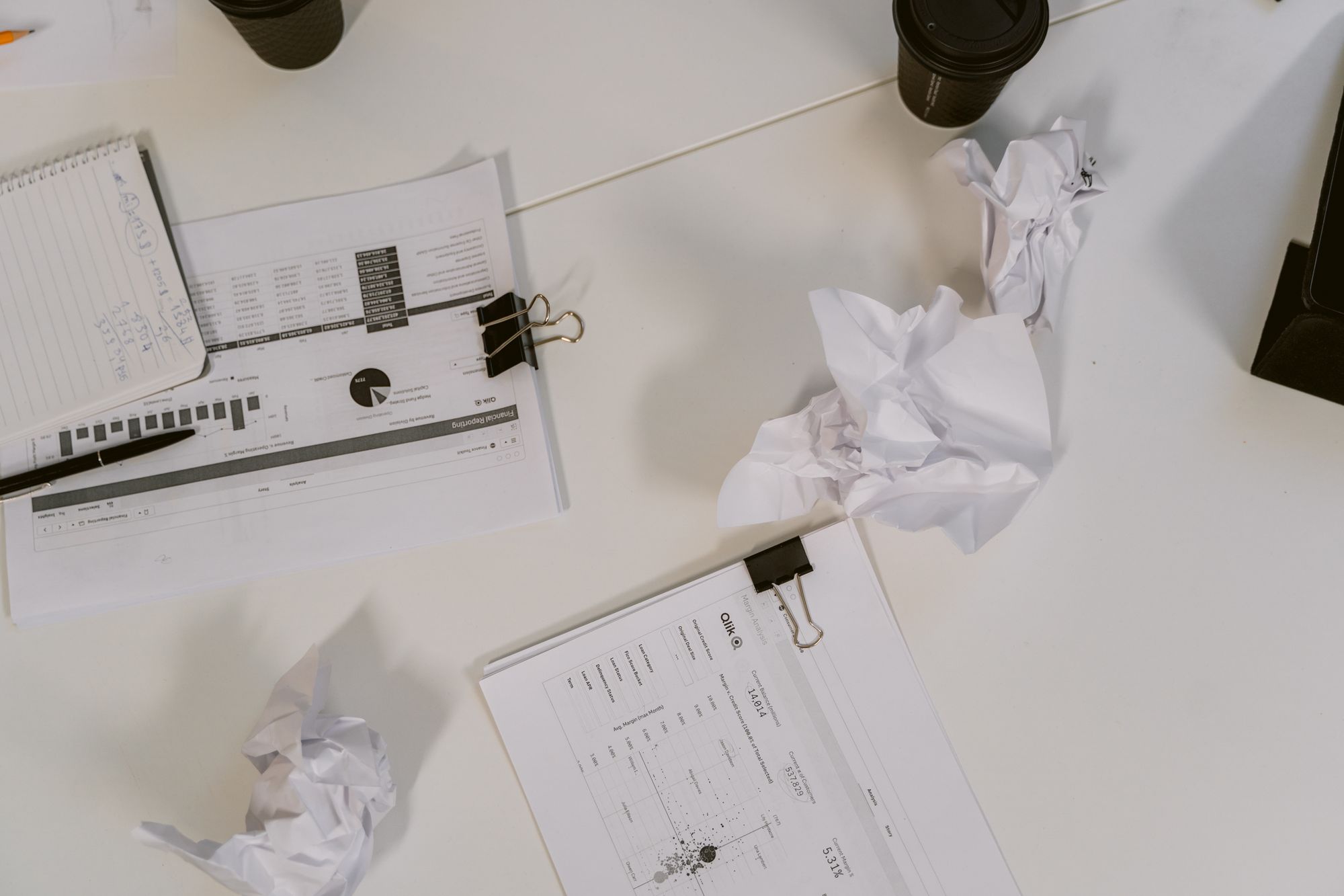 Business documents and notes prepared for a compensation discussion