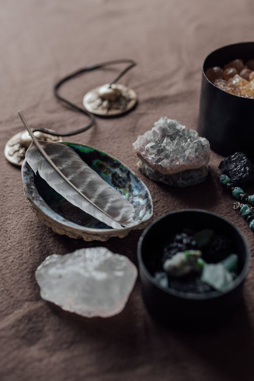 Minerals and Feather in Bowls