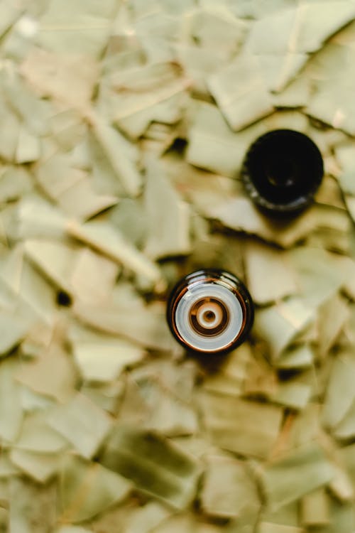 Black Bottle on a Wooden Table Top