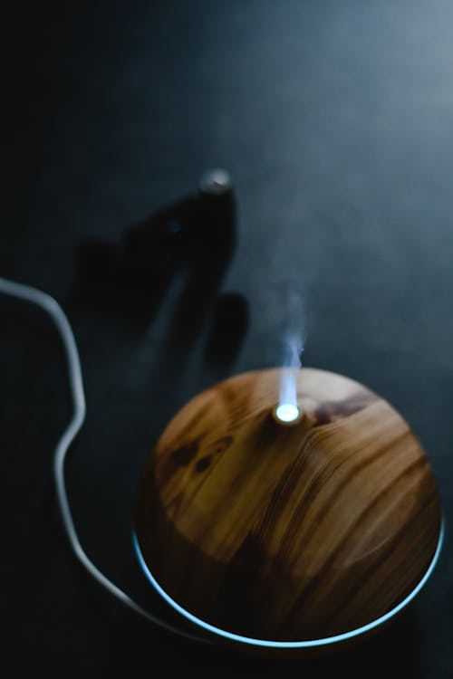 Close-Up Shot of Brown Wooden Diffuser