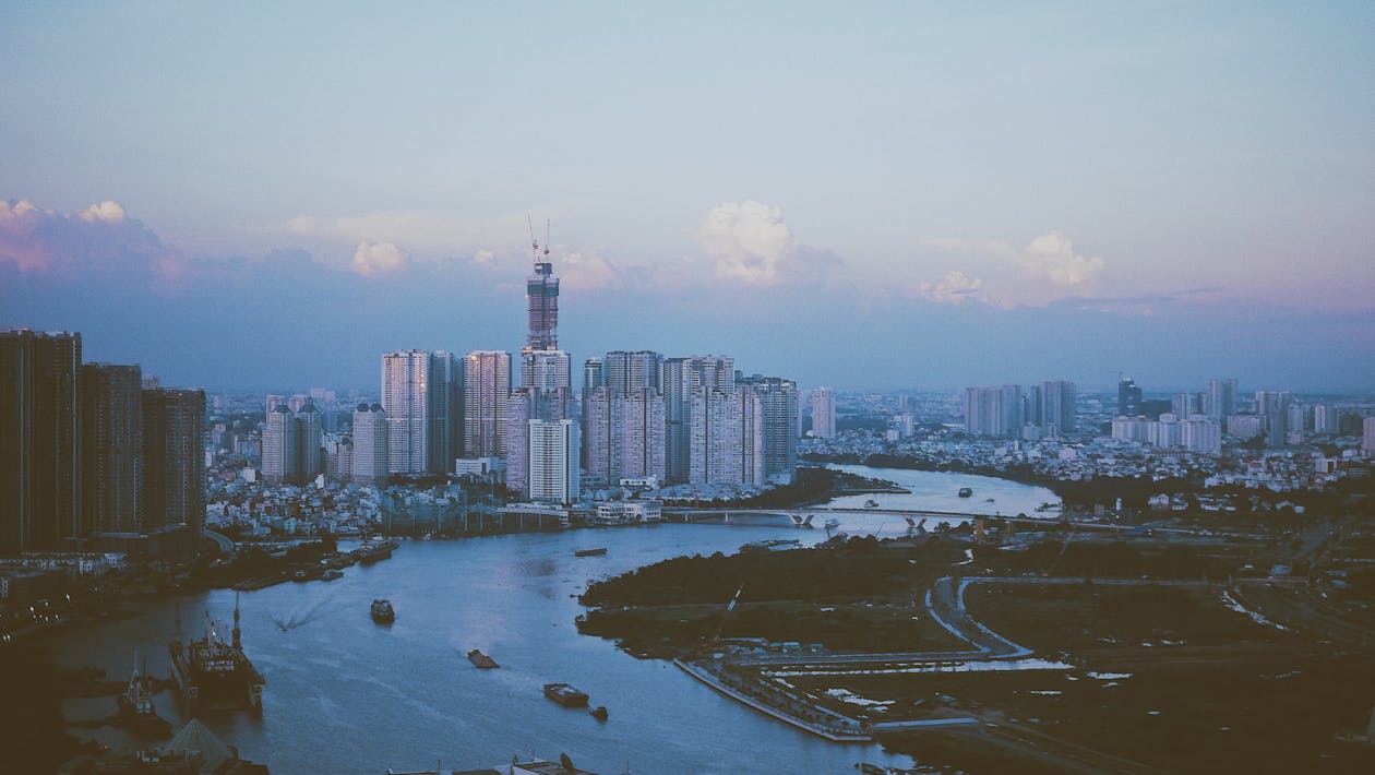 High Rise Building Near the Body of Water Photo