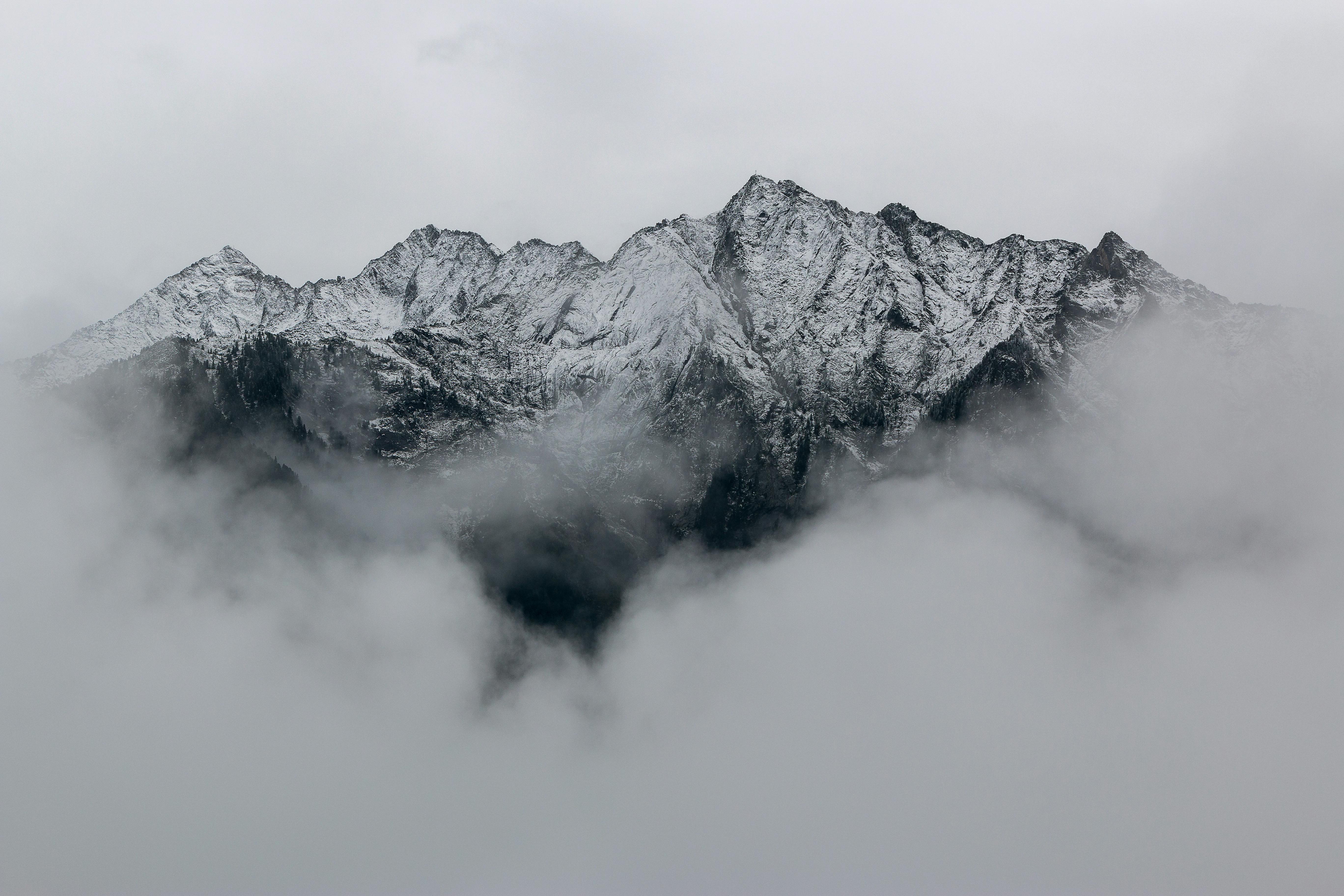 landscape photography of mountains covered in snow