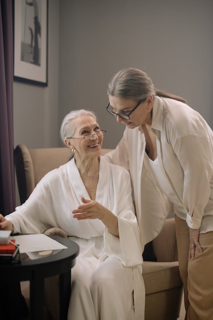 Two Elderly Women Talking Together 