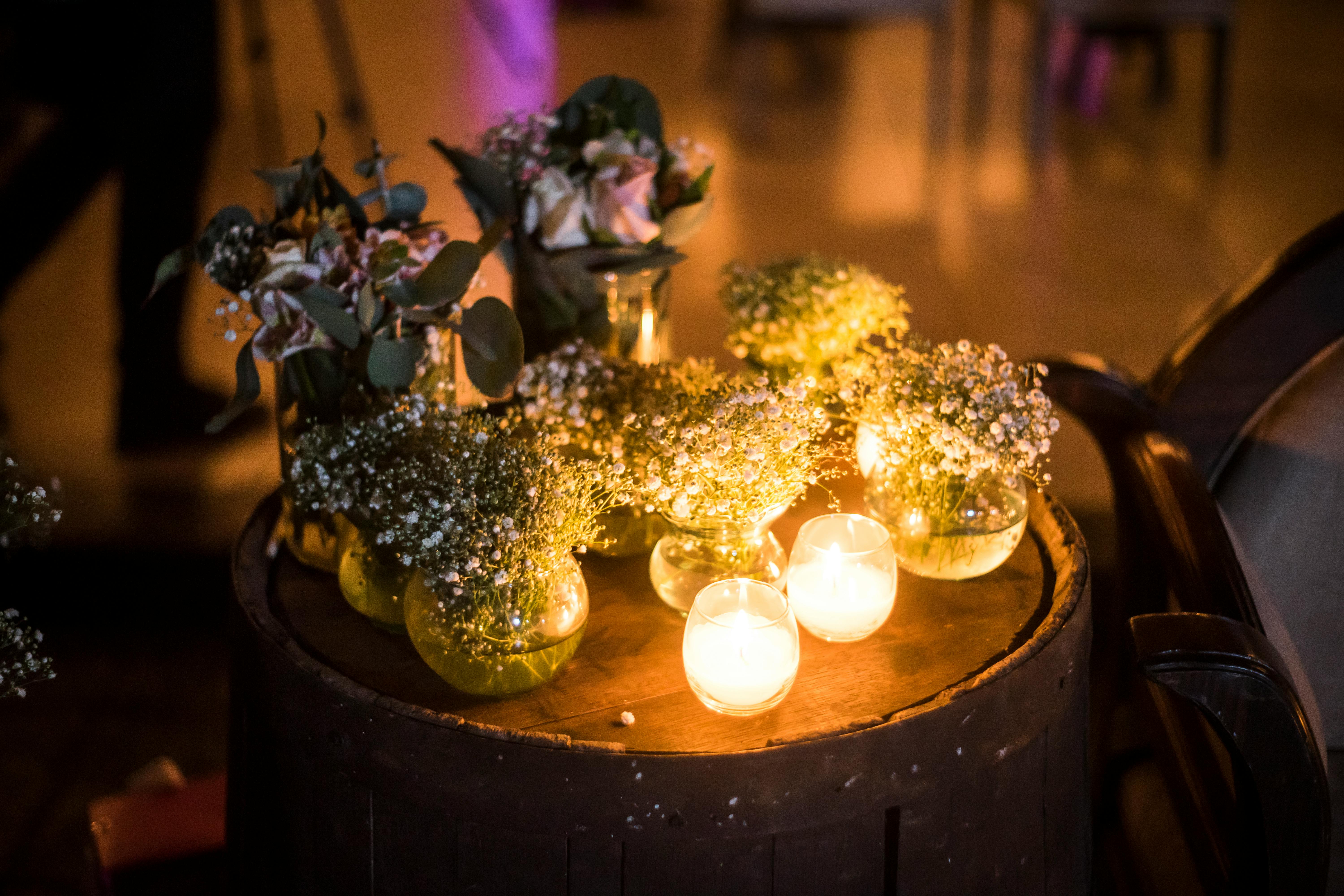 Eucalyptus Garland On A Long Table With White Votive Candles