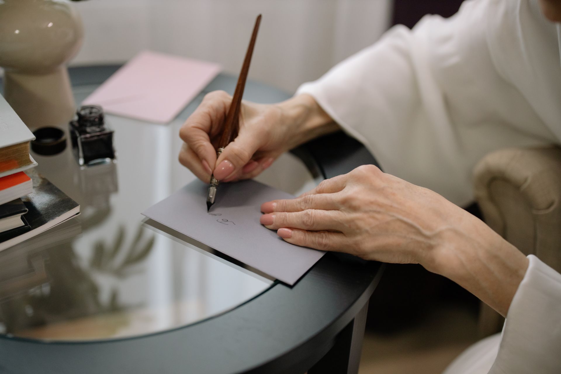 A Person Writing on the Envelope