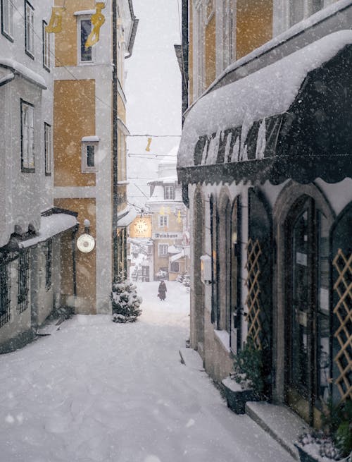 Photos gratuites de bâtiments, citadin, couvert de neige