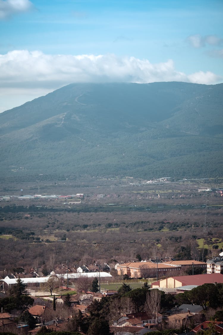 Flat Land Near A Mountain Under Blue Sky