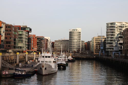 White Boat Docked on Harbor