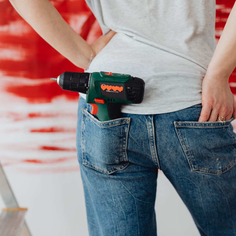 Painters and Decorators in Willesden — a decorator at work mid-project