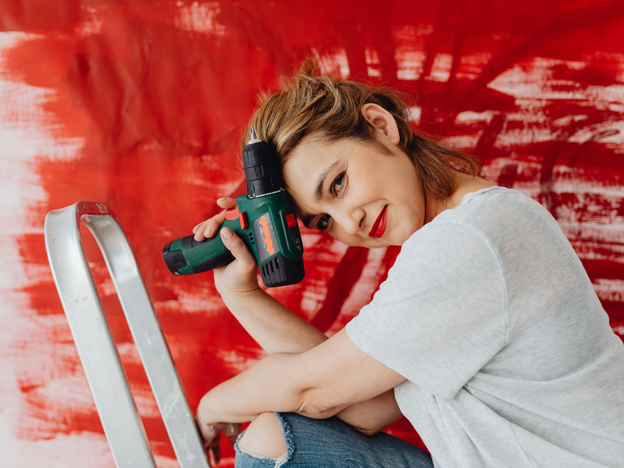 Interior Painting in East Barnet, Barnet — decorator applying interior paint to walls and ceilings