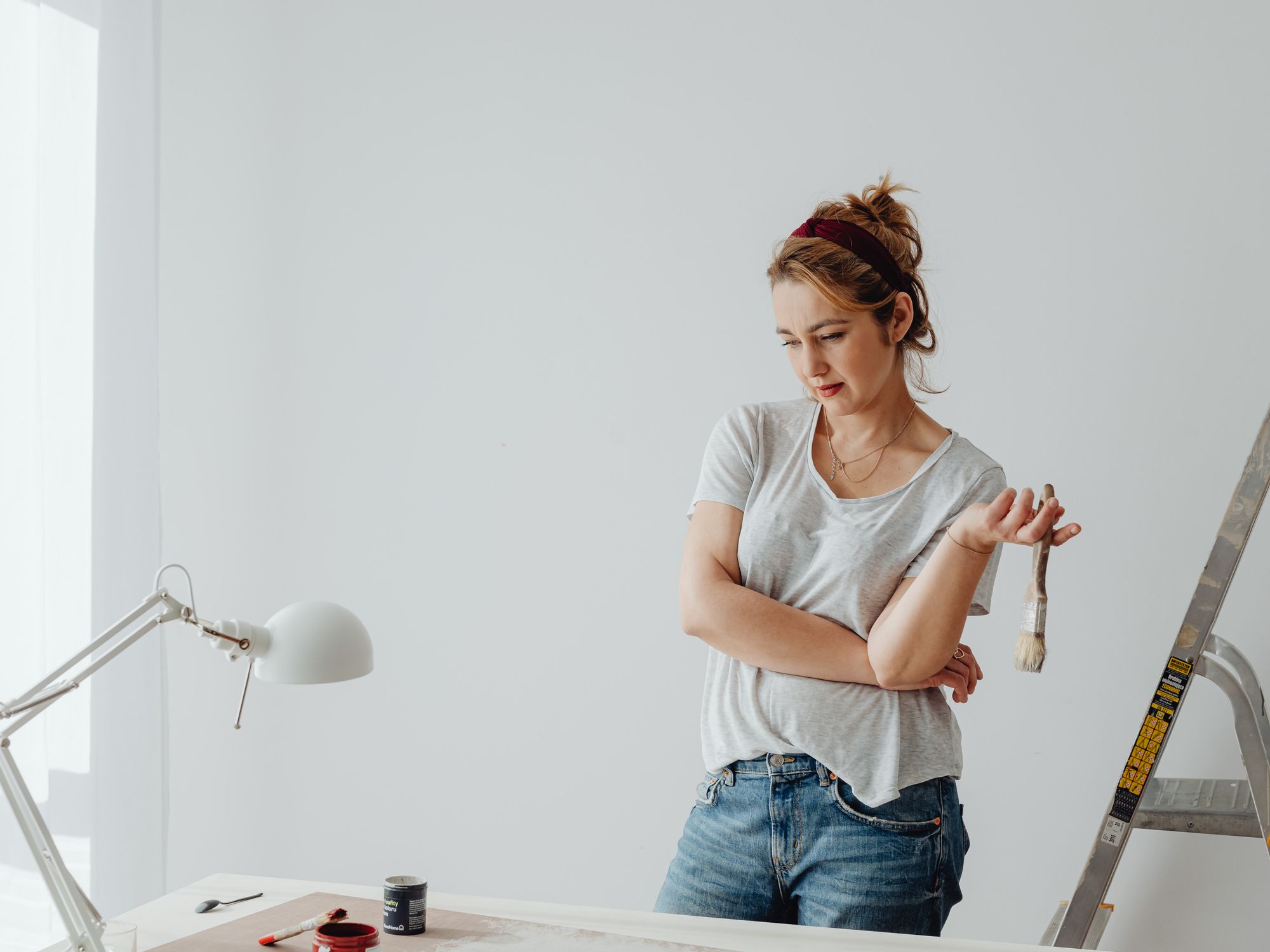 Interior Painting in Fulwell, Richmond upon Thames — decorator applying interior paint to walls and ceilings