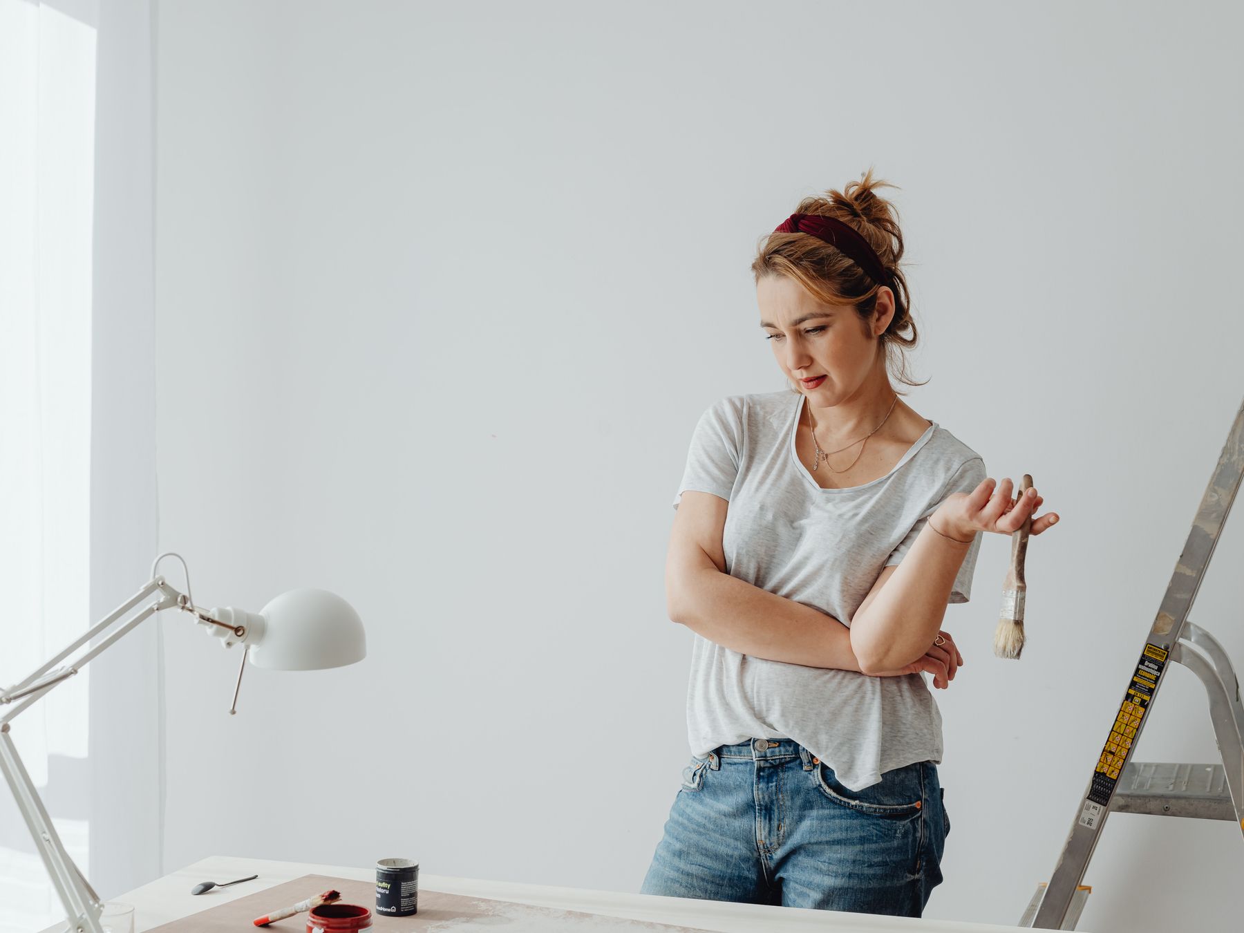 Painters and Decorators in Longlands — a decorator at work mid-project