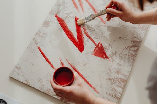 Free Red Paint on White Paper Stock Photo