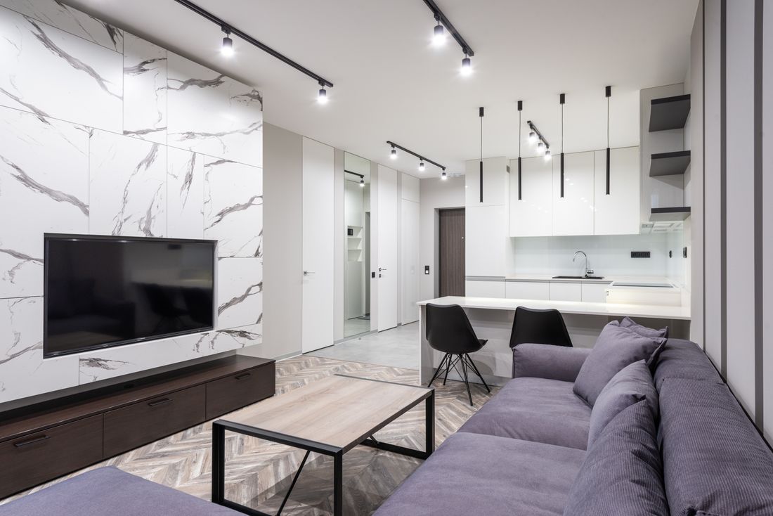 Smart storage and space planning in a modern 3 BHK interior