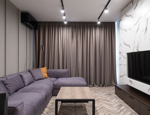 Elegant modern living room with corner sofa property