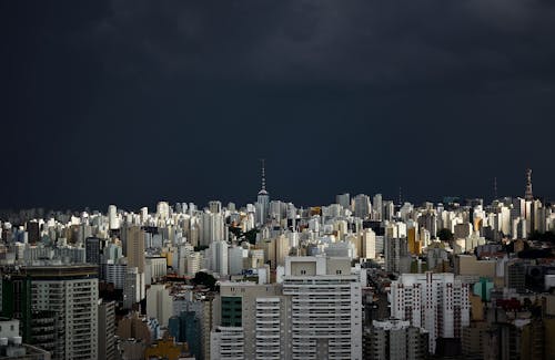 Free Photo of the City against a Stormy Sky Stock Photo