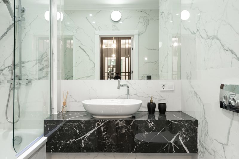 Pacific Heights — elegant soapstone bathroom with contemporary vessel sink and modern fixtures