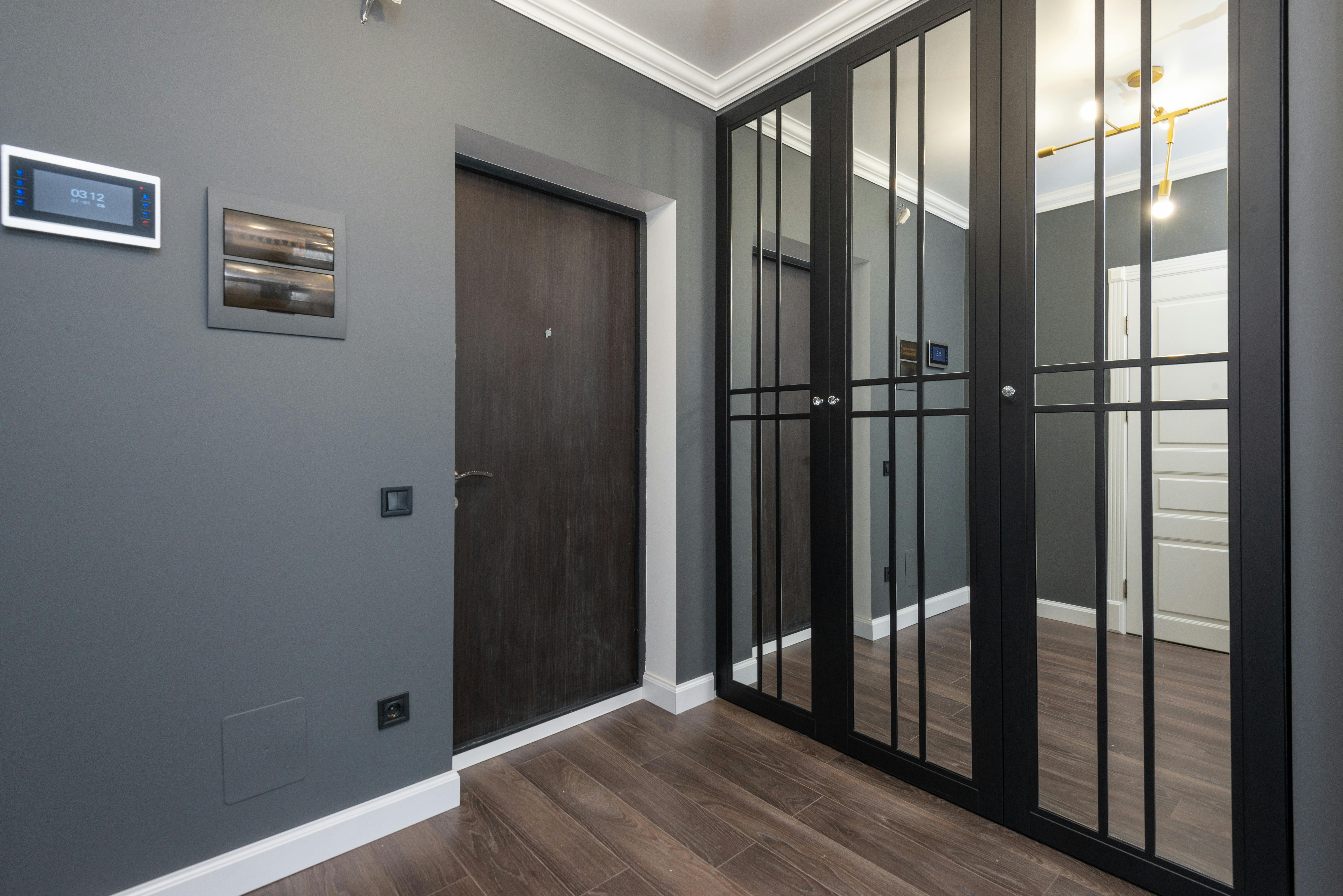 spacious hall of contemporary apartment with gray walls