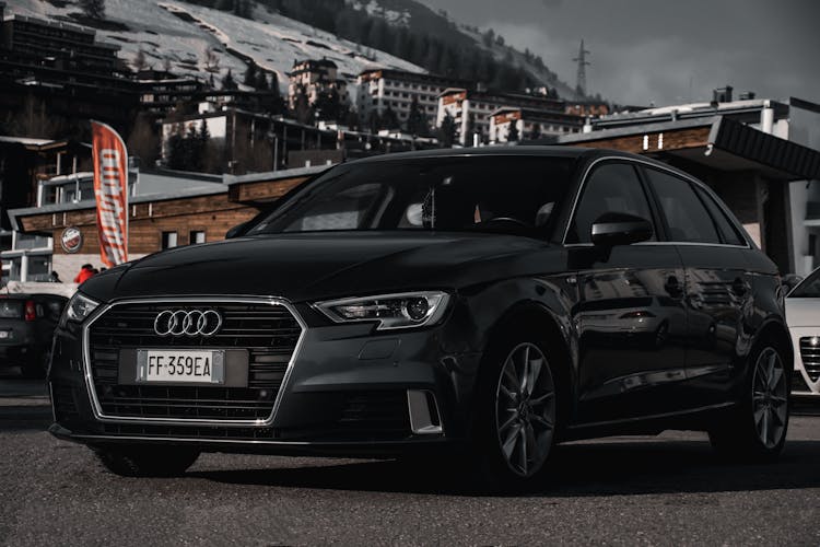 Black Audi On Asphalt Road