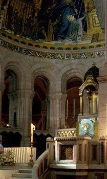 Stunning interior view of the Sacré-Cœur Basilica in Paris showcasing its ornate architecture and art.