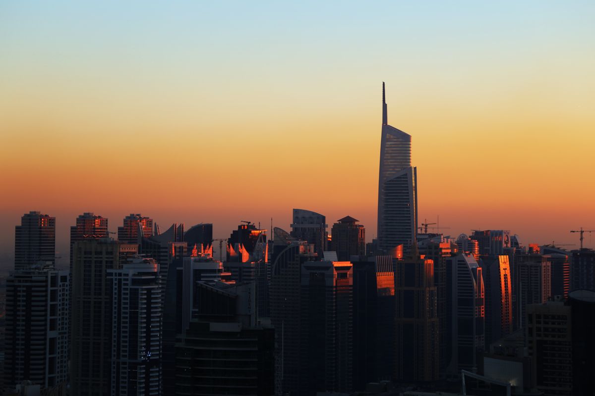 Dubai commercial skyline representing market connection