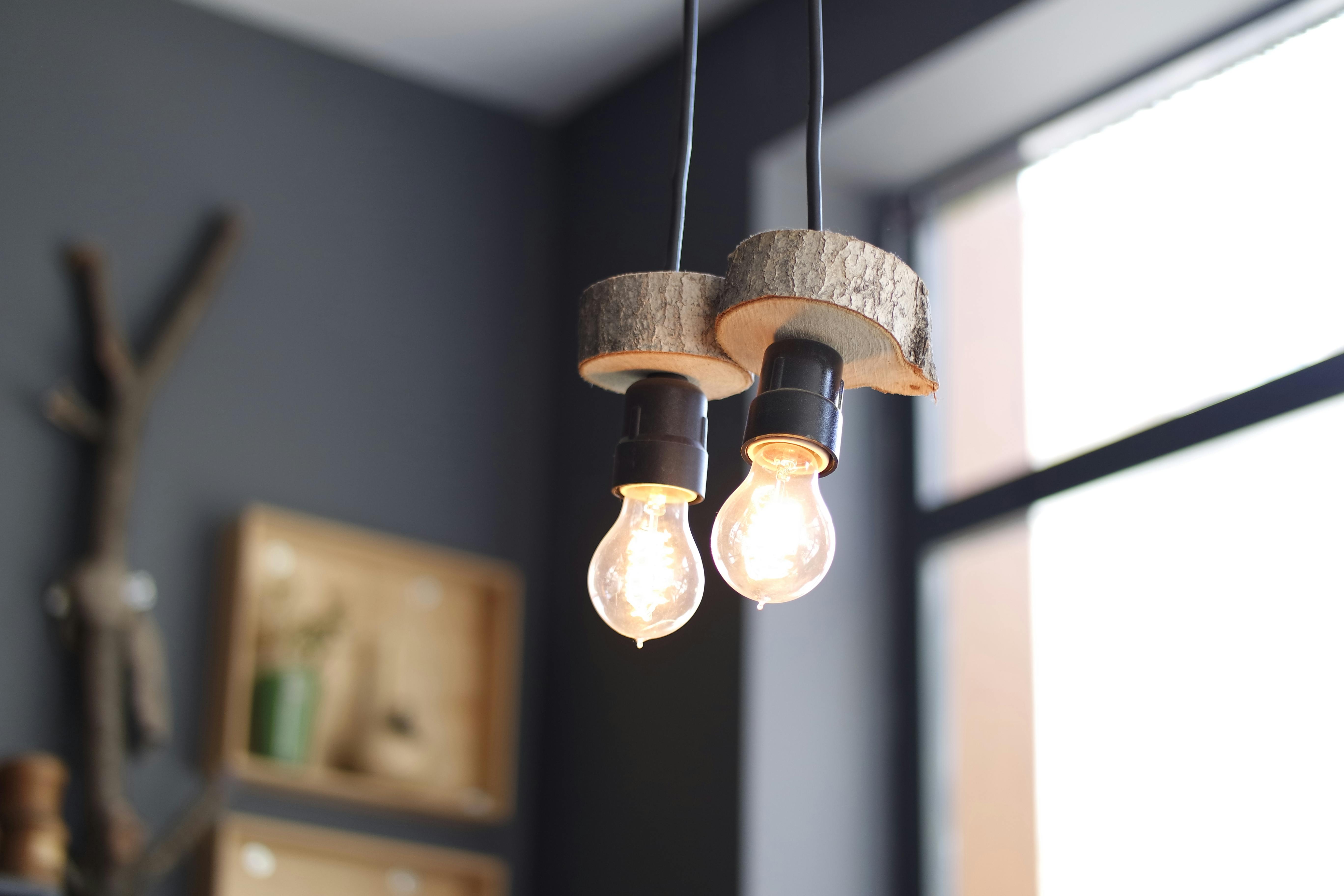 2 Turned on Hanging Lamps · Free Stock Photo