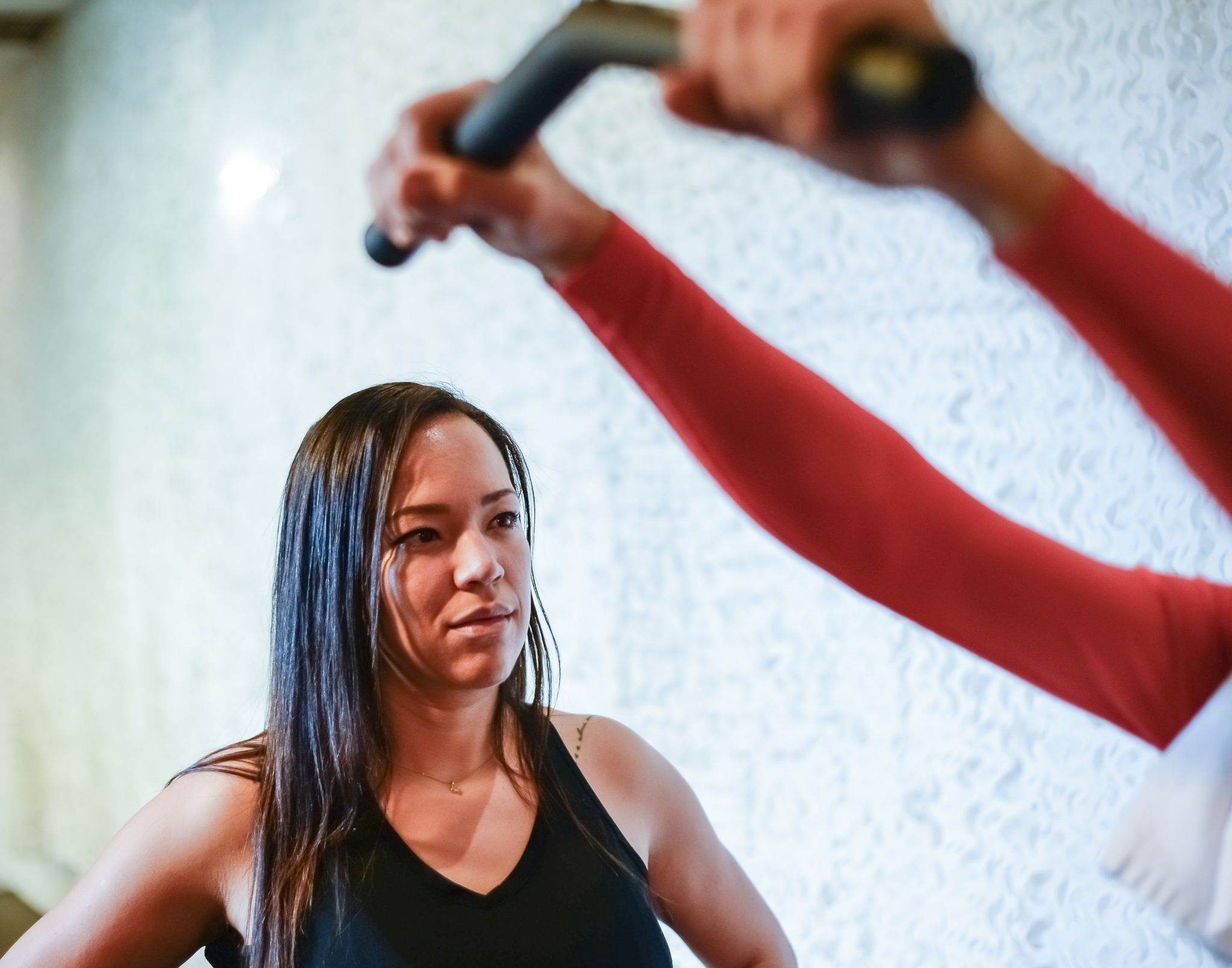 Personal trainer coaching a client