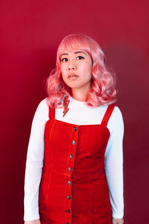 Blonde Haired Girl in White Long Sleeve Shirt and Red Jumper