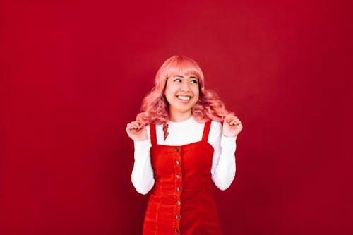 Woman Touching Her Colored Hair