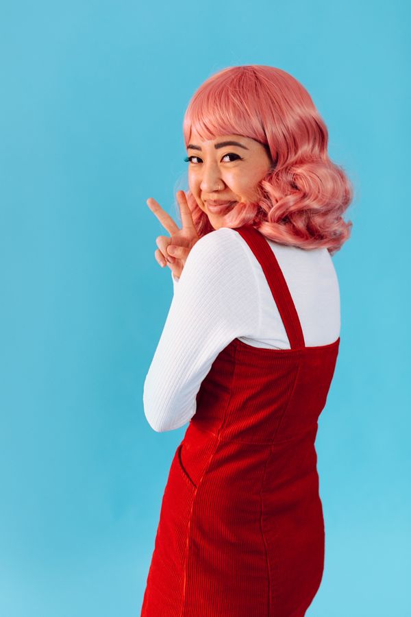 Woman wearing a corduroy pinafore dress