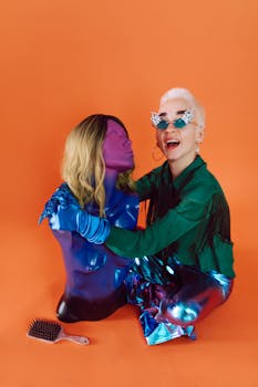 Colorful fashion portrait featuring playful styling and unique glitzy sunglasses.