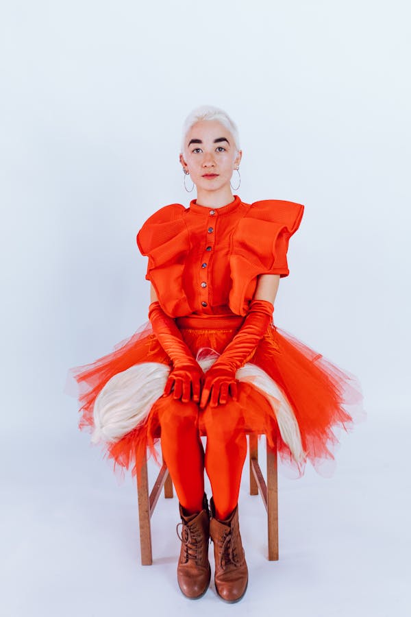 Woman in Red Dress With Wings