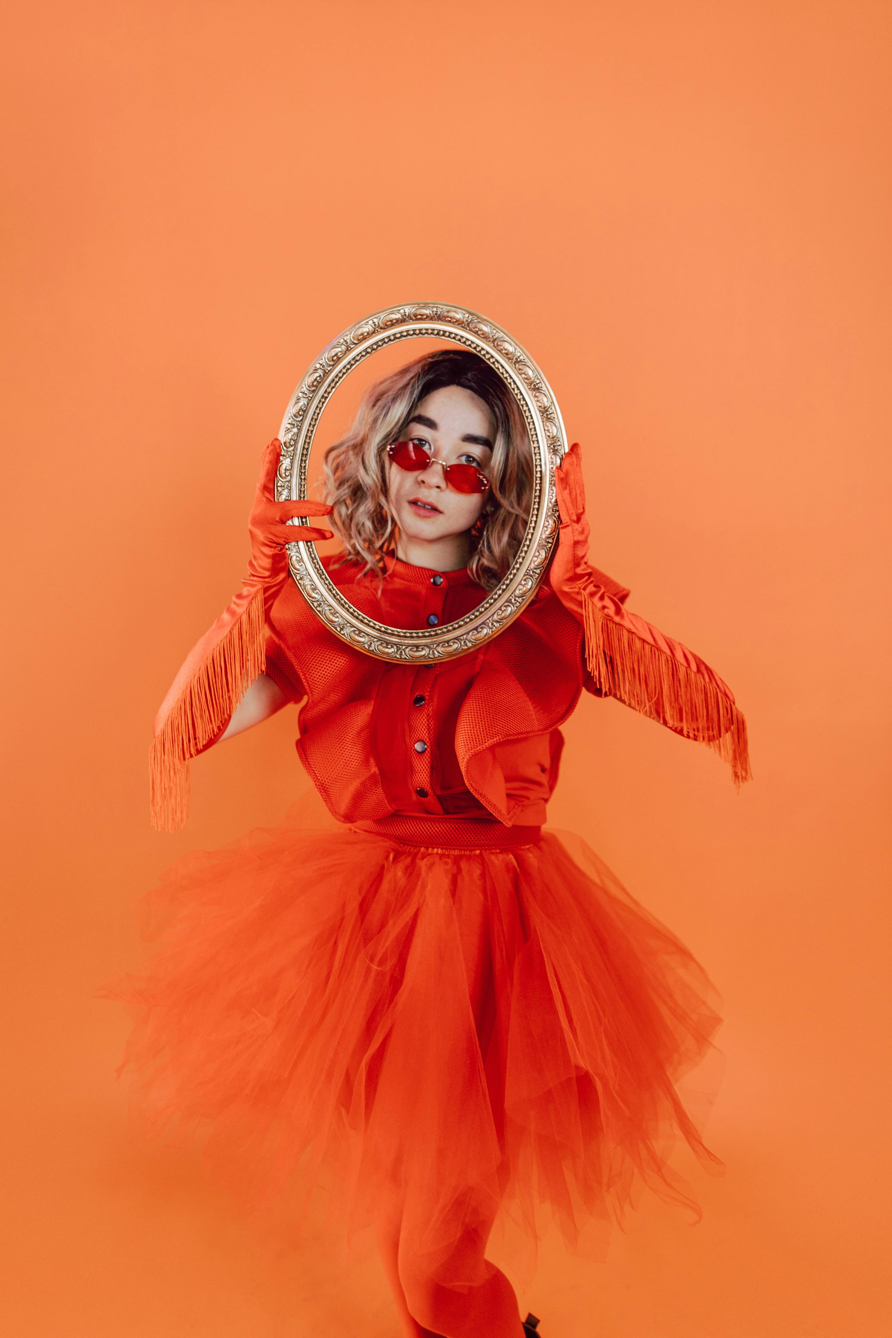 woman in red long sleeve dress