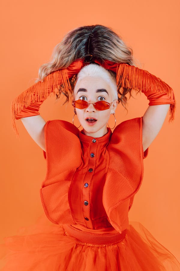 Woman in Orange Button Up Shirt