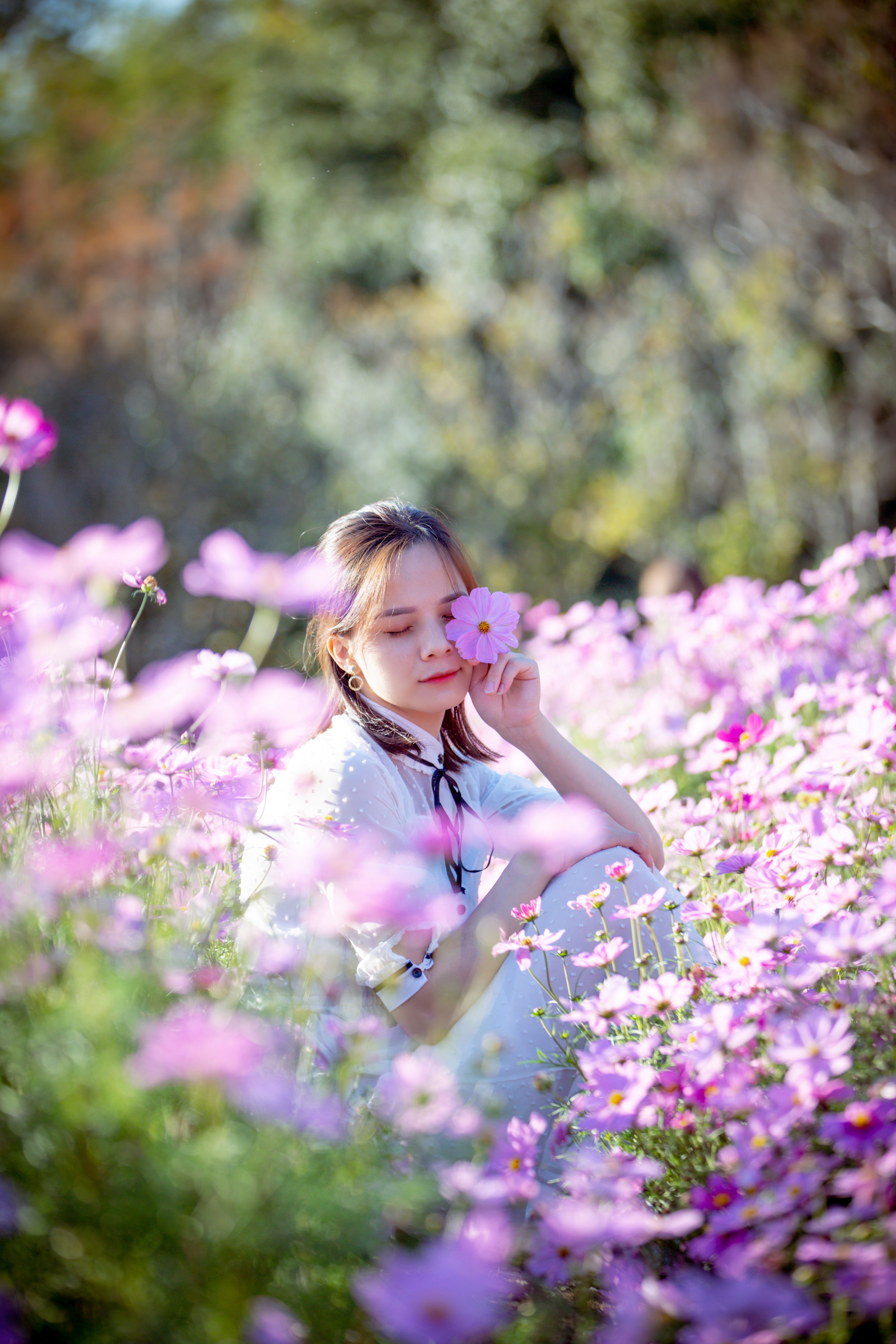 Girl with her Eyes Closed in a Flower Field · Free Stock Photo