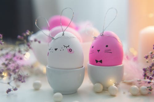 Pink and White Easter Bunny Eggs On Ceramic Cups
