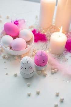 Bright pastel Easter eggs arranged with candles and decorations, perfect for celebrating Easter indoors.