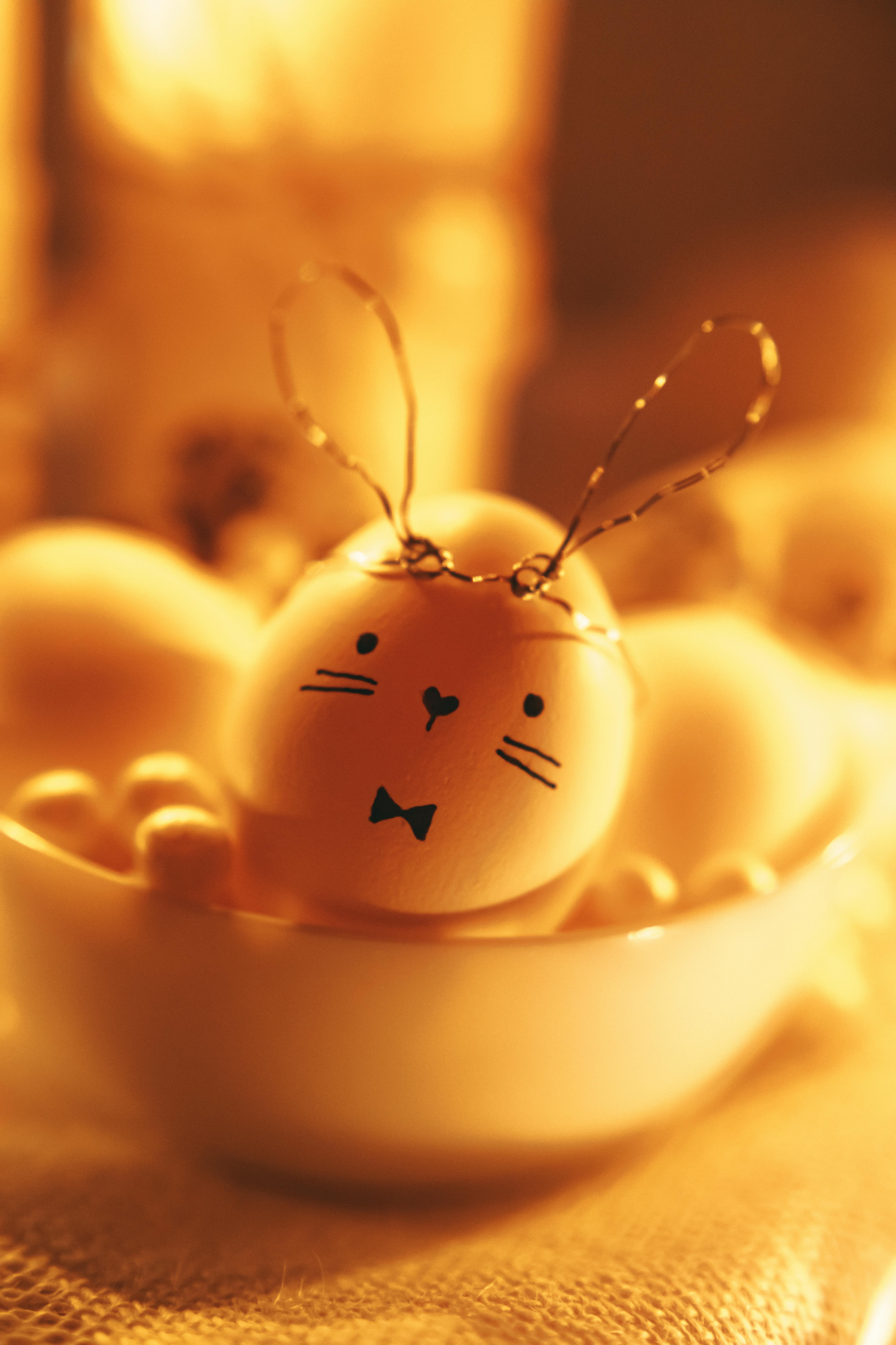 golden easter bunny egg in a bowl