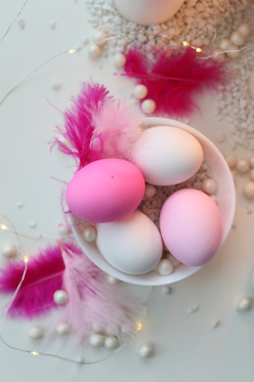 Pink Colored Eggs In A Bowl